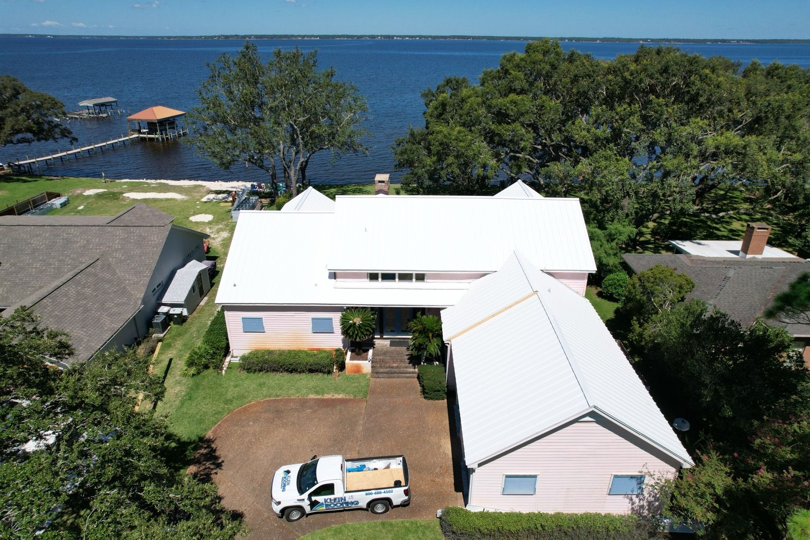 White Metal Roof on a Bayfront Home